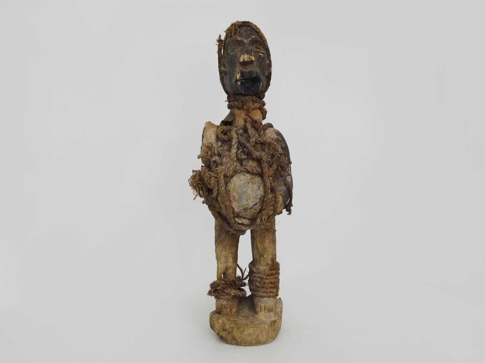 Large Nkisi Nkondi Fetish Reliquary Statue With Nails And A Ventral Reliquary Box. Congolese Fetish In Carved Wood, 1950s. photo furniture