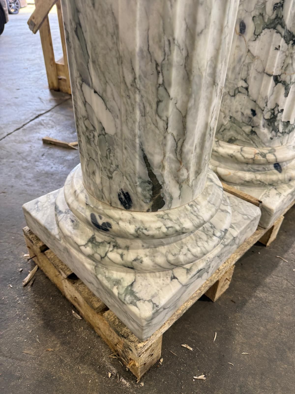 Pair Of Grand Fluted Verde Alpi Marble Columns On Stepped Bases photo vinterior