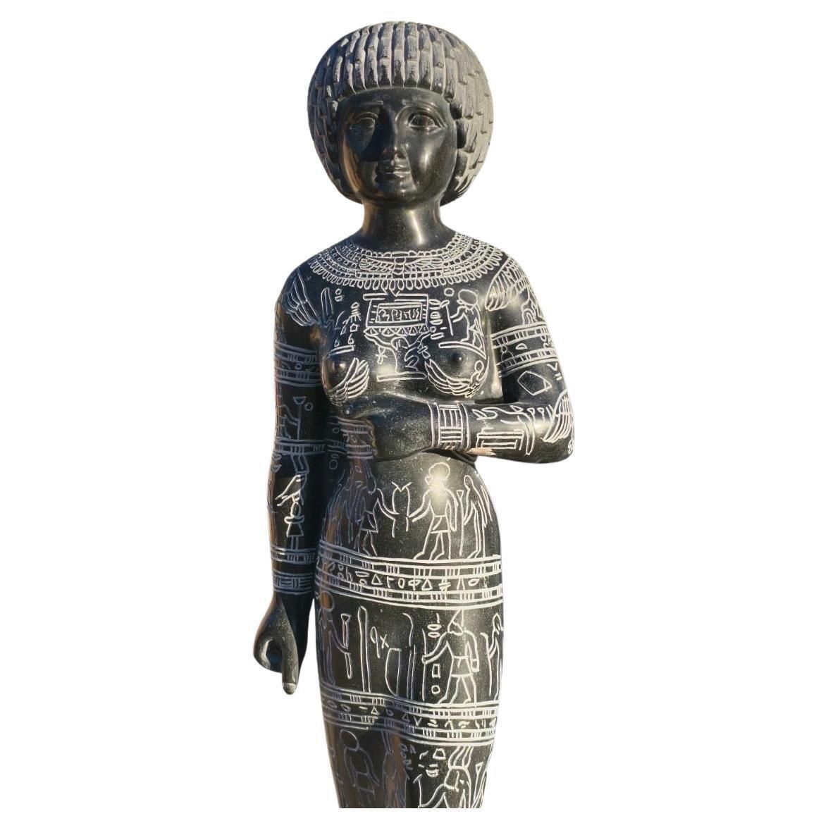 Black Marble Female Sculpture With Engraved Egyptian Hieroglyphs On Marble Base photo for sale