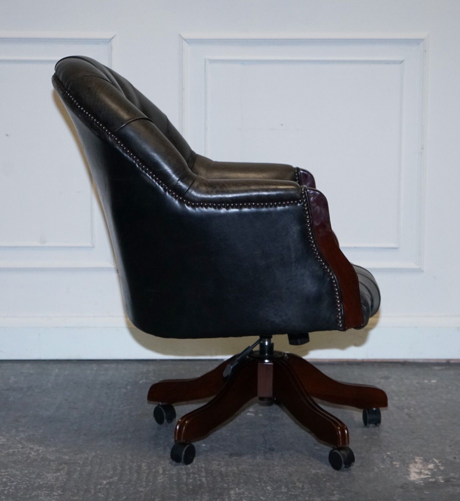 photo buy Vintage Chesterfield Dark Aged Grey Leather Directors Swifel Captains Chair