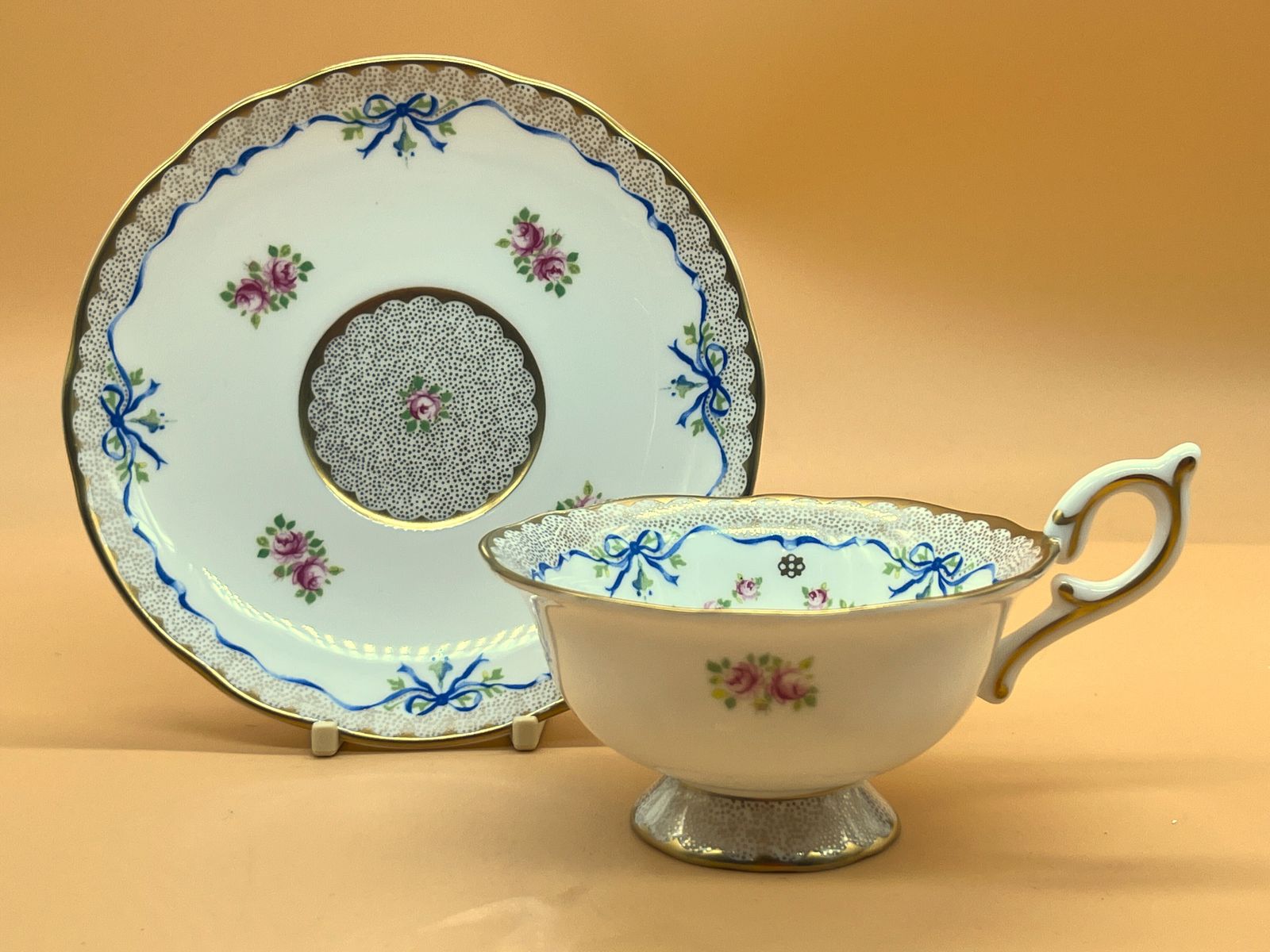 Wedgwood China Harlequin Collection Ribbon And Roses Design Footed Tea Cup And Saucer Duo. photo Home Decor