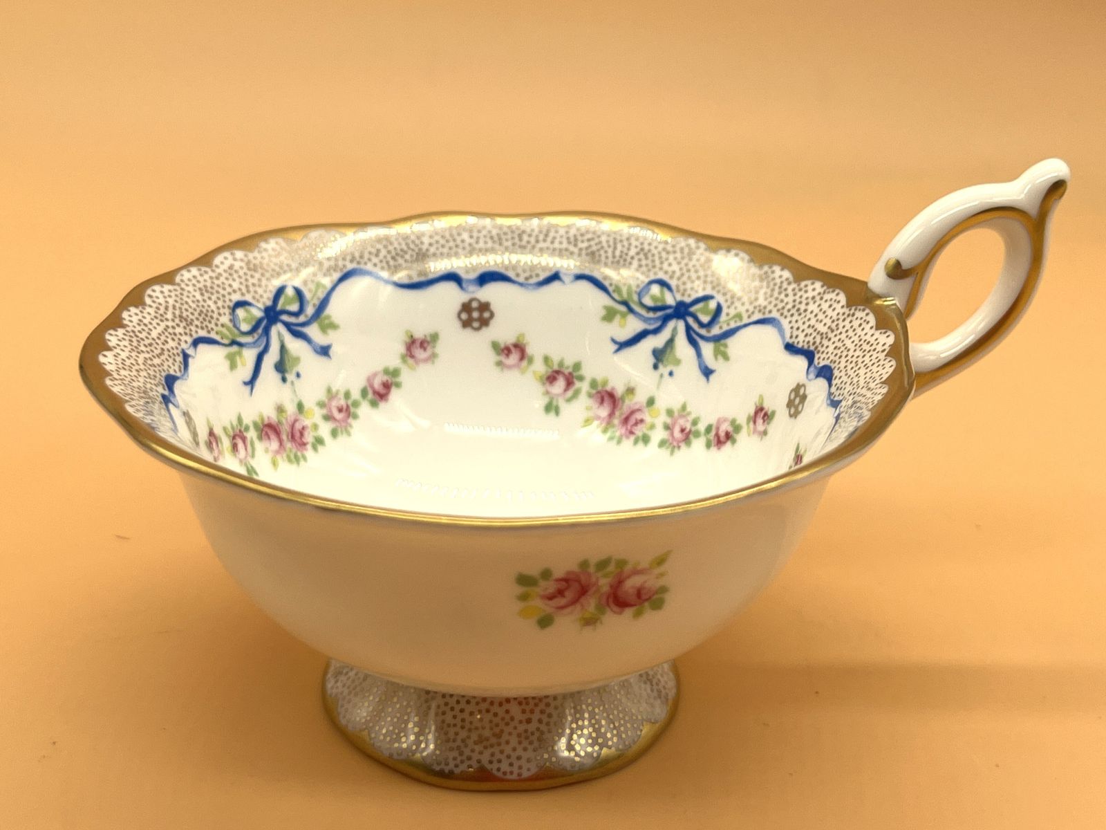Wedgwood China Harlequin Collection Ribbon And Roses Design Footed Tea Cup And Saucer Duo. photo vinterior