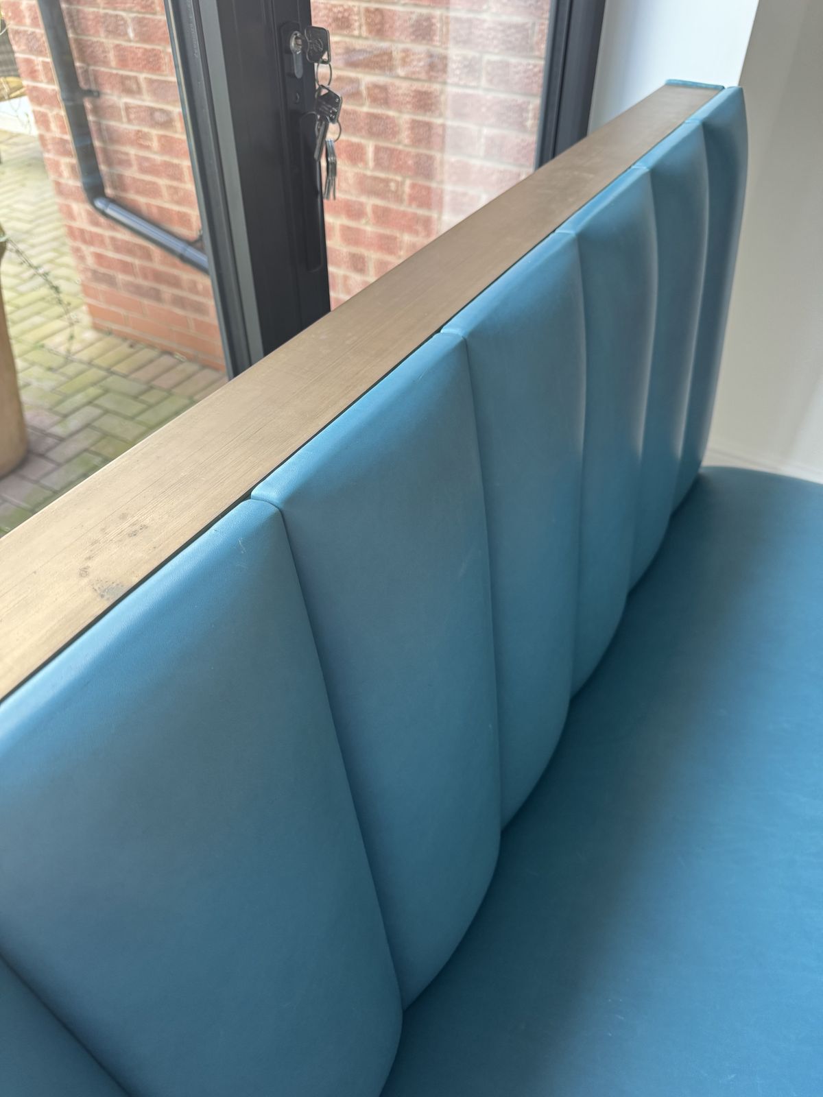 Retro Leather And Aged Brass Sofa In A Teal Colour Bought Originally From House Curious photo for sale