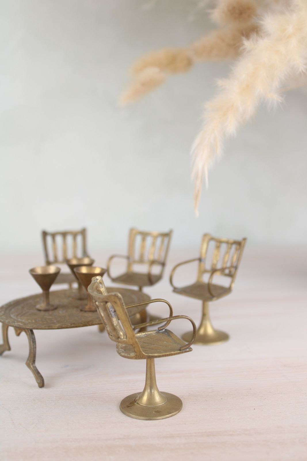 Set Of Miniature Brass Chairs And A Table photo for sale