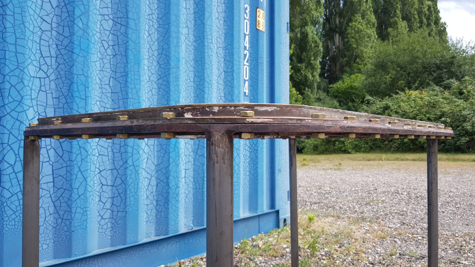 photo vintage Table With Old Brass Ship's Porthole With Iron Base / 110 X 70 X 76 Cm