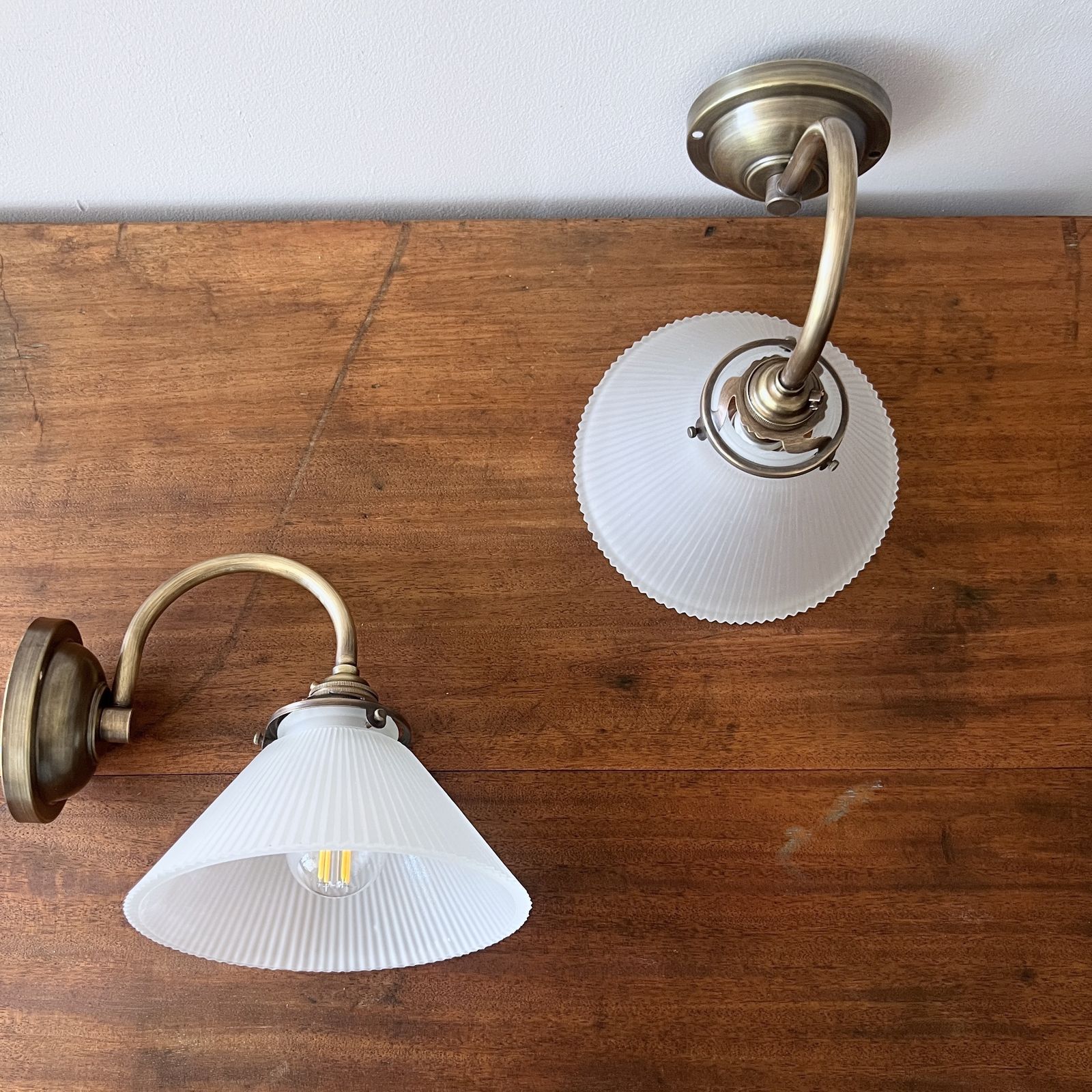 Newly Made Antique Brushed Brass Wall Lights With Contemporary Frosted Conical Shades photo for sale