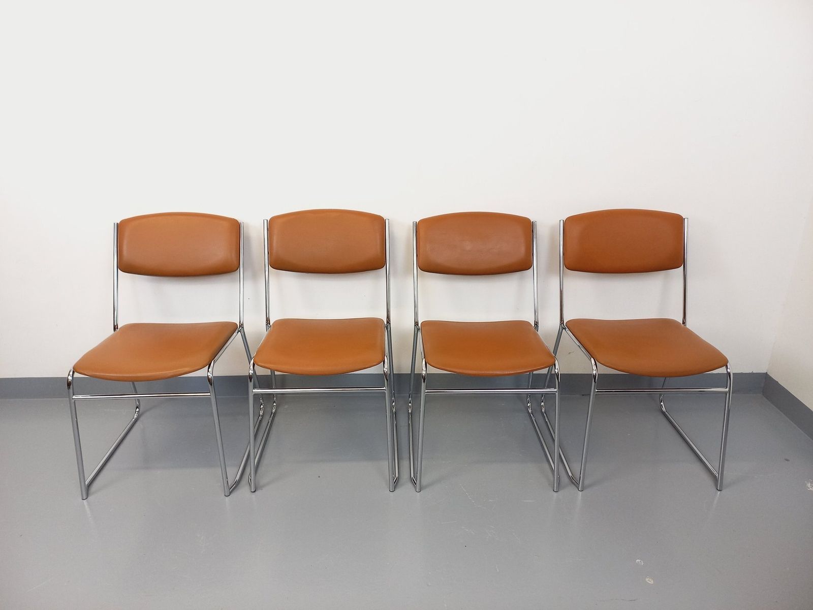 4 Chrome Metal And Cognac Leatherette Sled Chairs photo Furniture
