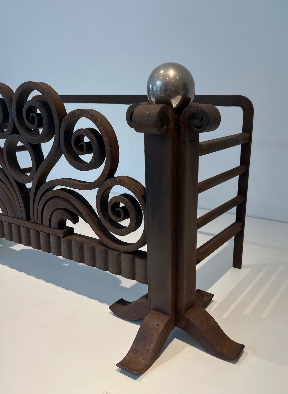 Home Decor Log Basket Or Andirons In Hammered Wrought Iron And Chrome In The Style Of Edgar Brandt. Circa 1930 photo