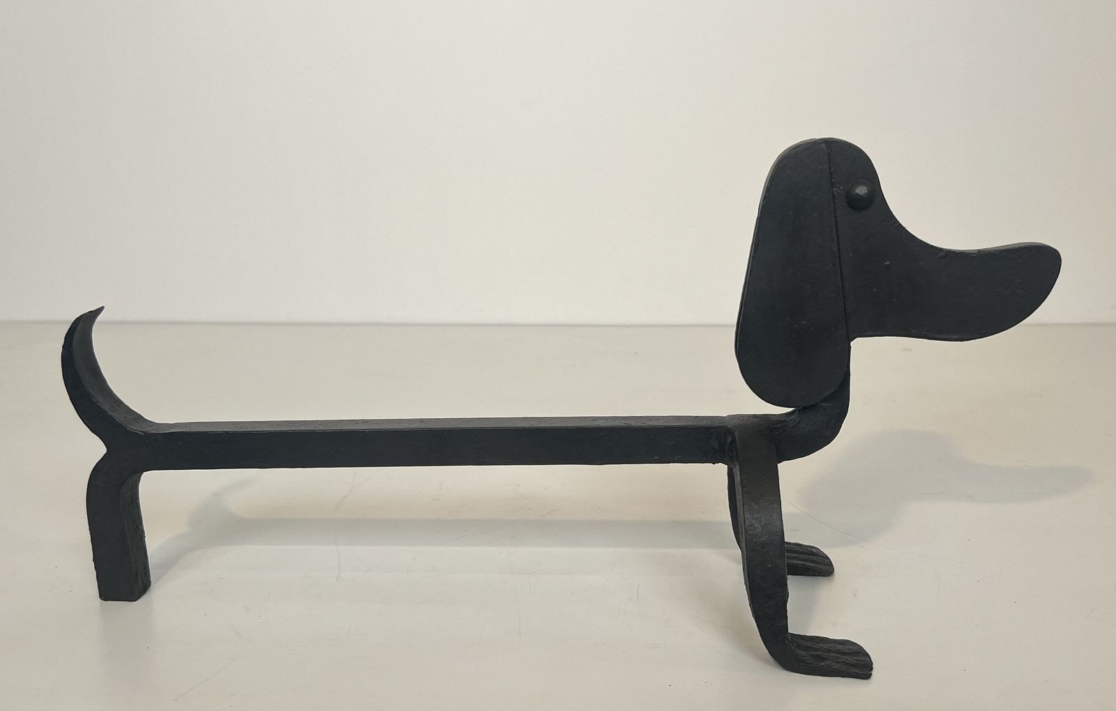 photo vintage Pair Of Wrought Iron Andirons Depicting Dachshunds Attributed To Edouard Schenck