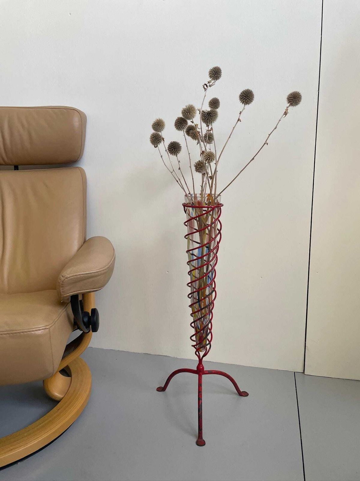 photo for sale Large Painted Conical Glass Floor Vase And Red Ironwork Spiral Industrial Frame
