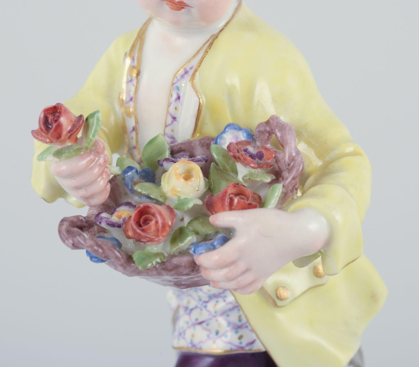Meissen, Germany. Porcelain Figurine Of Boy With Basket Of Flowers. Ca 1900 photo for sale