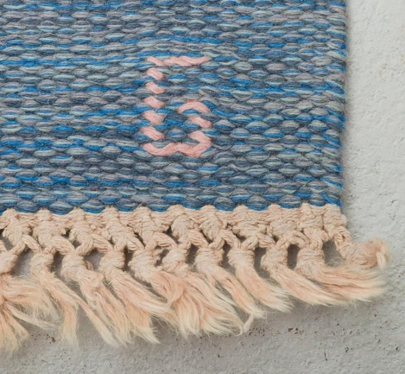 Swedish Carpet In Pure Wool. Geometric Pattern In Blue, White, And Pink Colors. photo furniture