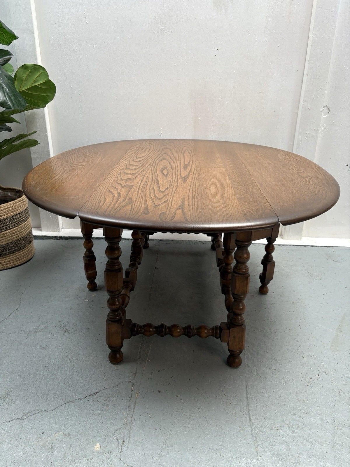 Furniture Ercol Trinity Solid Elm 2 Tier Drop Leaf Coffee Table In Golden Dawn photo