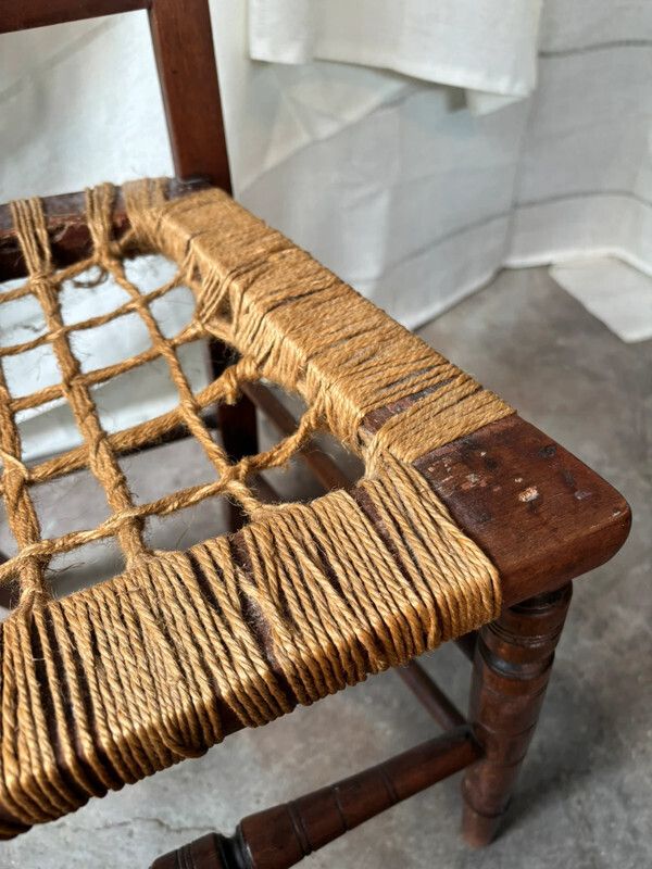 Vintage Wooden Spindle Chair With Carved Back And Woven Seat Frame photo for sale