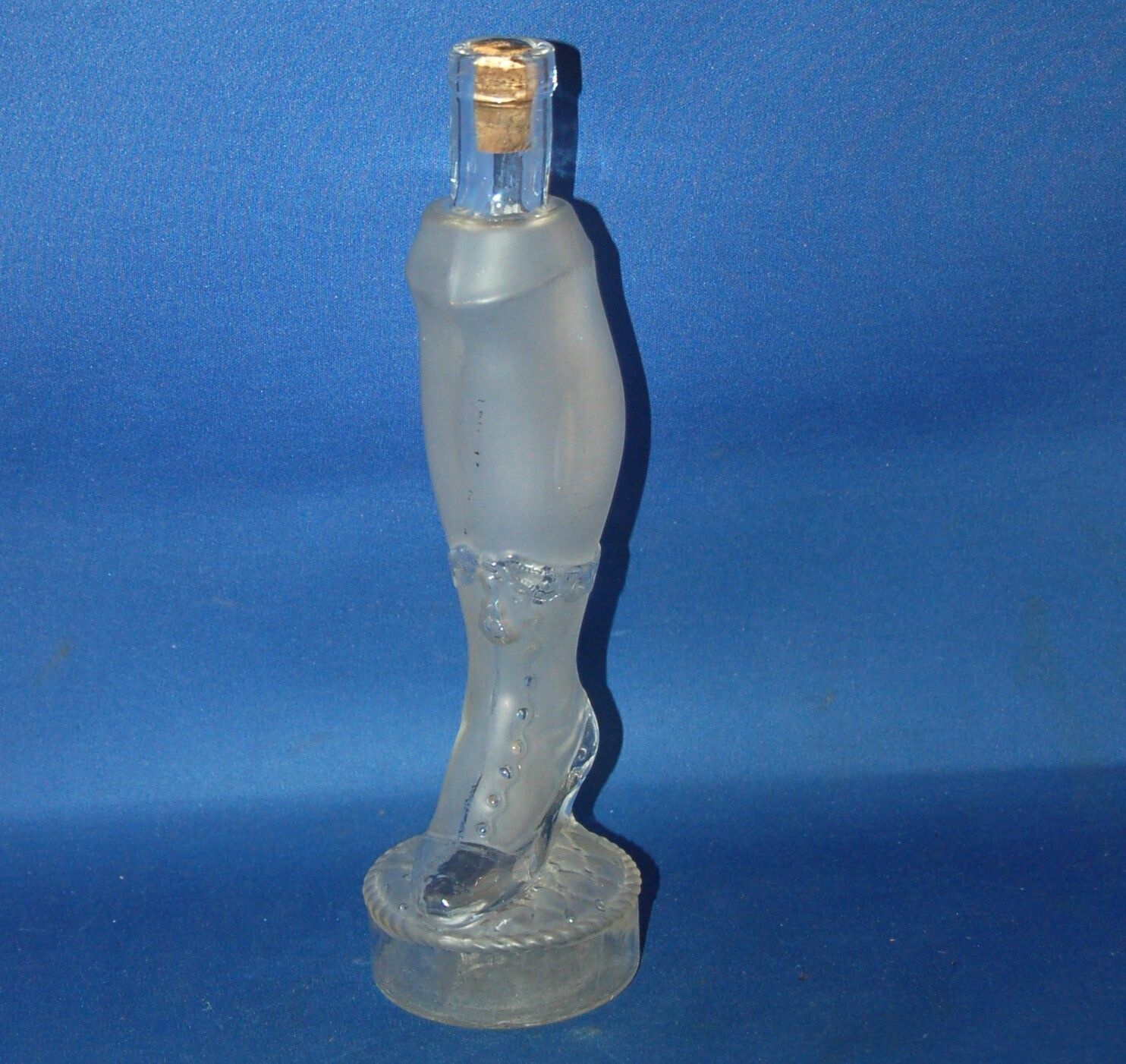 An Antique Lady’s Leg Scent Bottle, Opaque And Clear Glass photo furniture