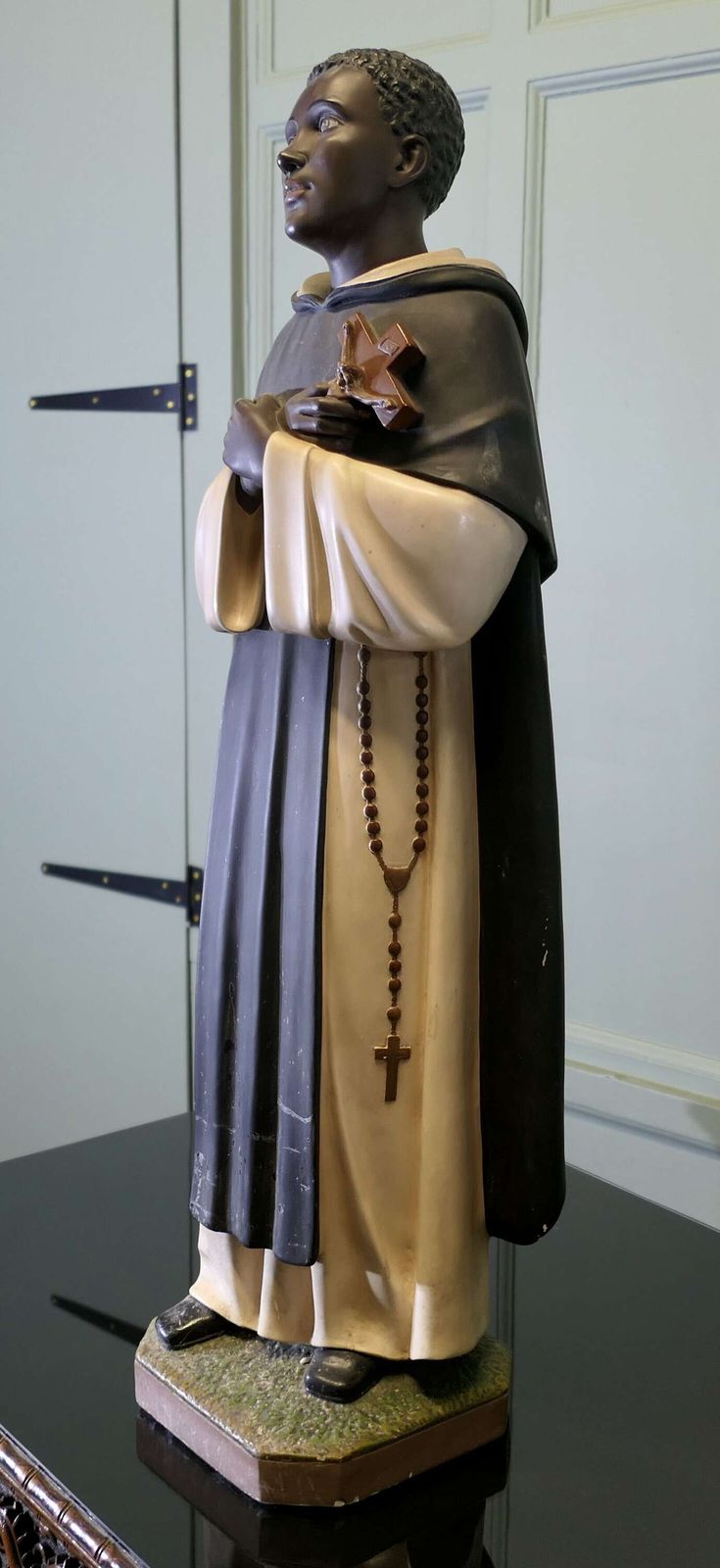 A Statue Of Saint Martín De Porres Velázquez Op photo 720.0