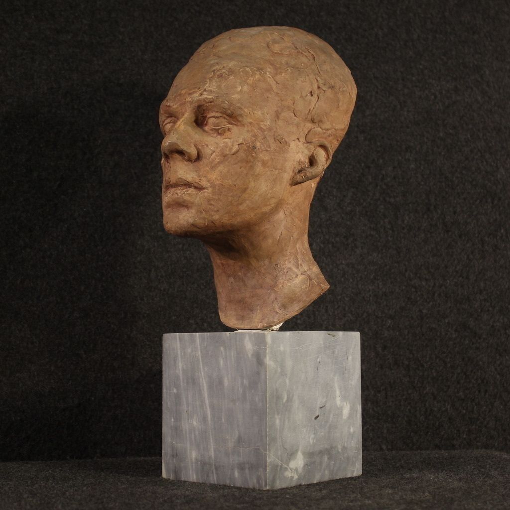 800.0 Terracotta Sculpture With Marble Base From The 20th Century photo