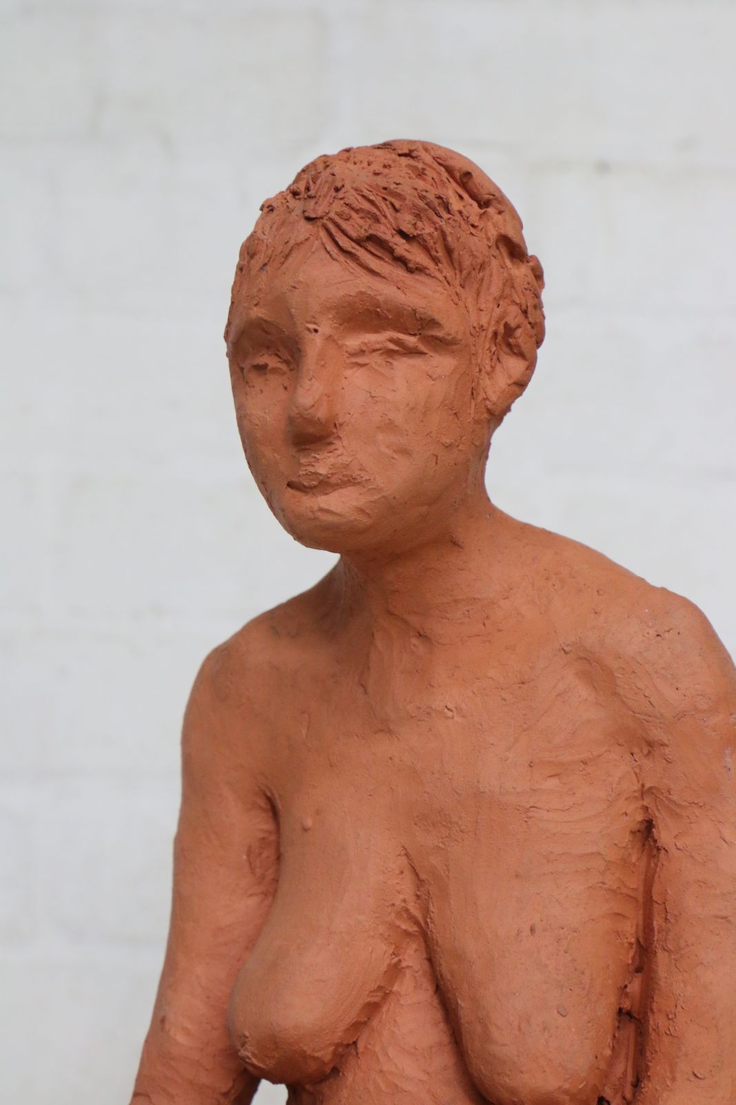 A Vintage Terracotta Sculpture Of A Seated Mature Woman One Of A Kind photo for sale
