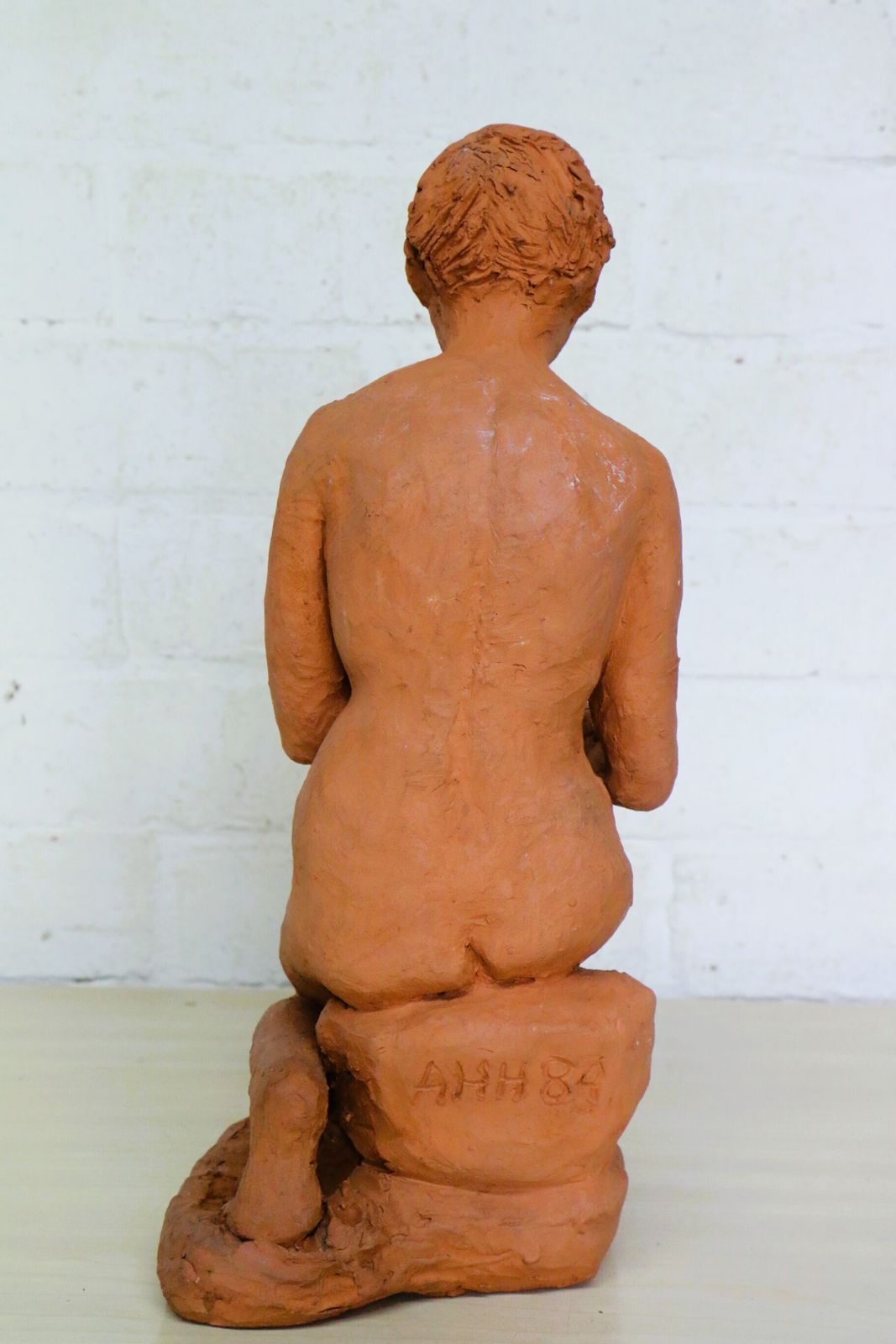 A Vintage Terracotta Sculpture Of A Seated Mature Woman One Of A Kind photo Art