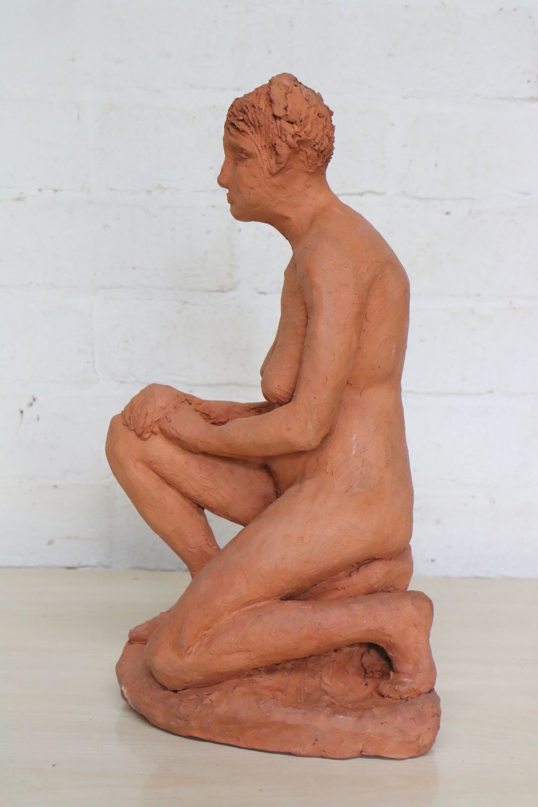 A Vintage Terracotta Sculpture Of A Seated Mature Woman One Of A Kind photo 275.0