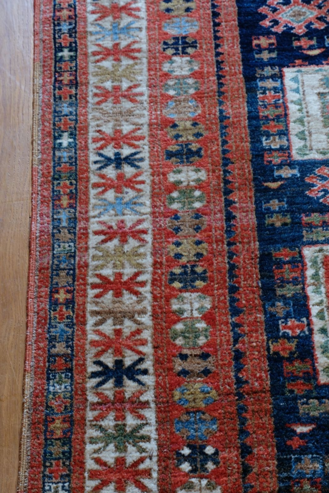 photo vintage Caucasus Kazak Wool Rug With Shield Kazak Medallions