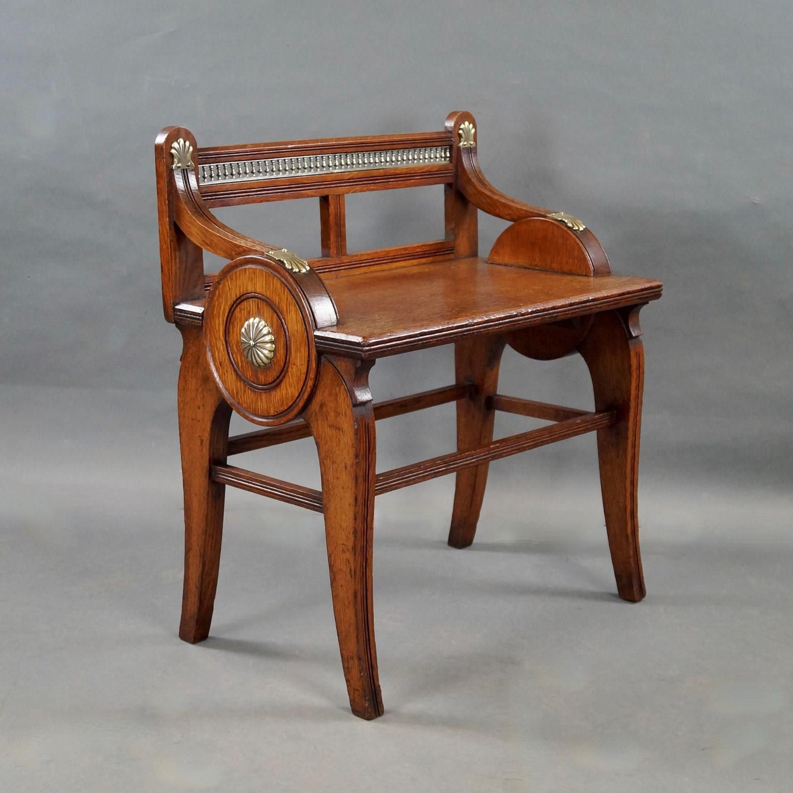 An Oak And Brass Mounted Hall Bench By James Shoolbred & Co. photo furniture