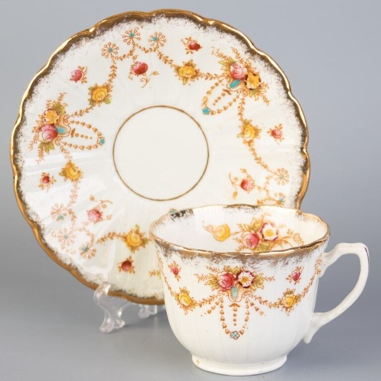 Antique Art Nouveau Bow Porcelain Ceramic Teacup & Saucer