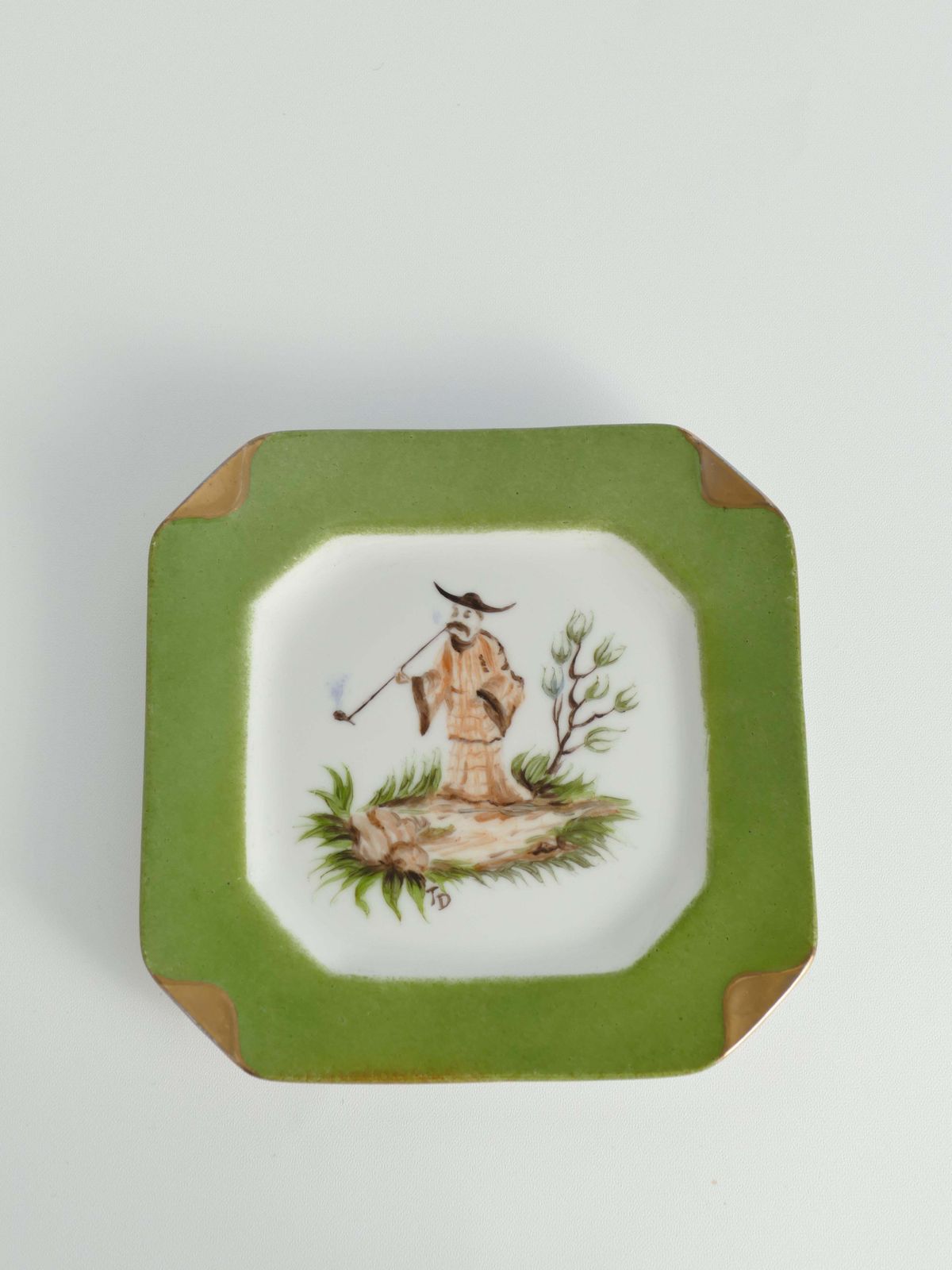 photo for sale Handpainted Green And Gold Porcelain Ashtray With Chinoiserie Smoking Motif