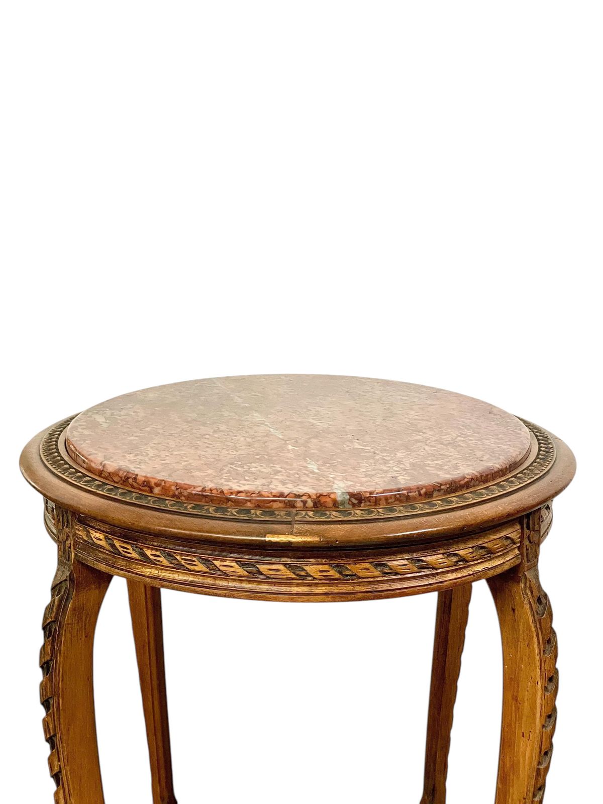 photo for sale 19th Century French Walnut Gueridon With Pink Marble Top And Caned Shelf