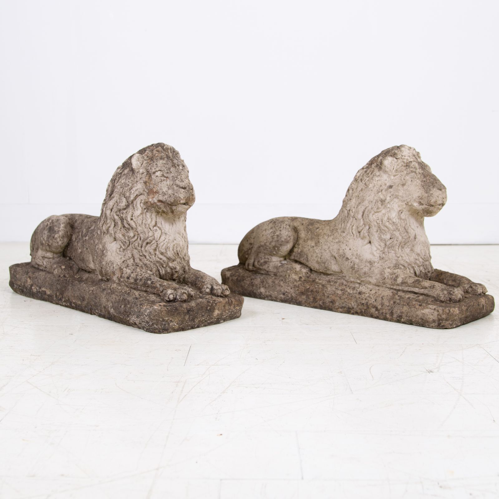 Pair Of Weathered Recumbent Garden Lions photo for sale