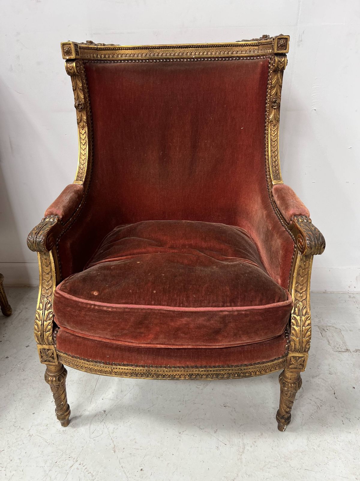 photo furniture Two Louis XVI Style Wing Chairs In Gilded Wood, 20th Century