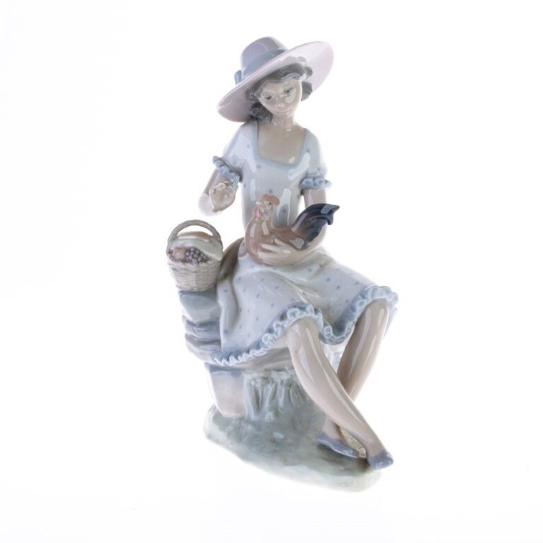 Mid Century Spanish Glazed Porcelain Sculpture Of A Girl With Hen In The Style Of Lladro