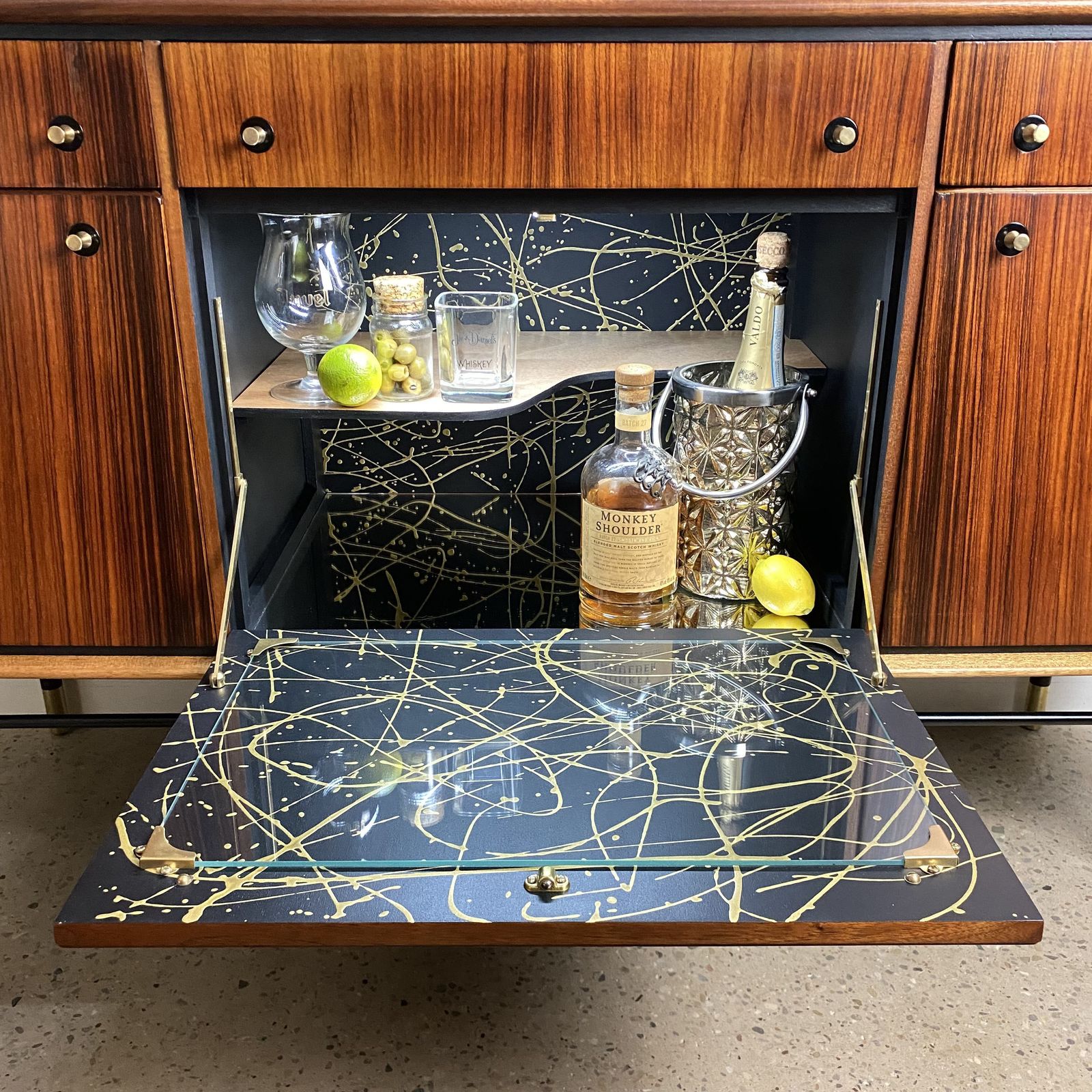 Mid Century Cocktail Bar Drinks Cabinet By Heal's In Rosewood And Brass With Black & Gold Jackson Pollock Paint Effect photo 1985.0