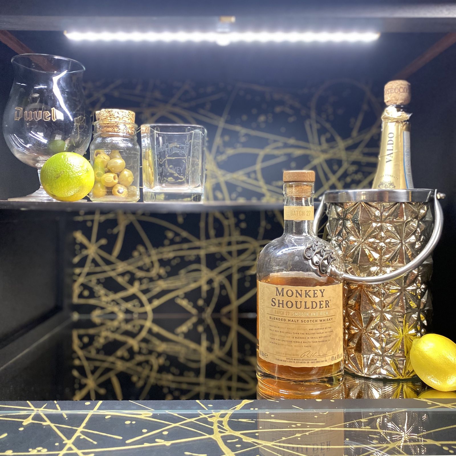 photo for sale Mid Century Cocktail Bar Drinks Cabinet By Heal's In Rosewood And Brass With Black & Gold Jackson Pollock Paint Effect