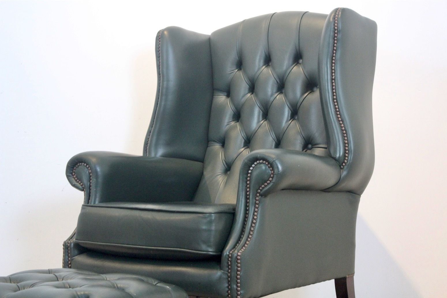 Classic Chesterfield Wingback Armchair With Footstool In Green Leather photo Furniture