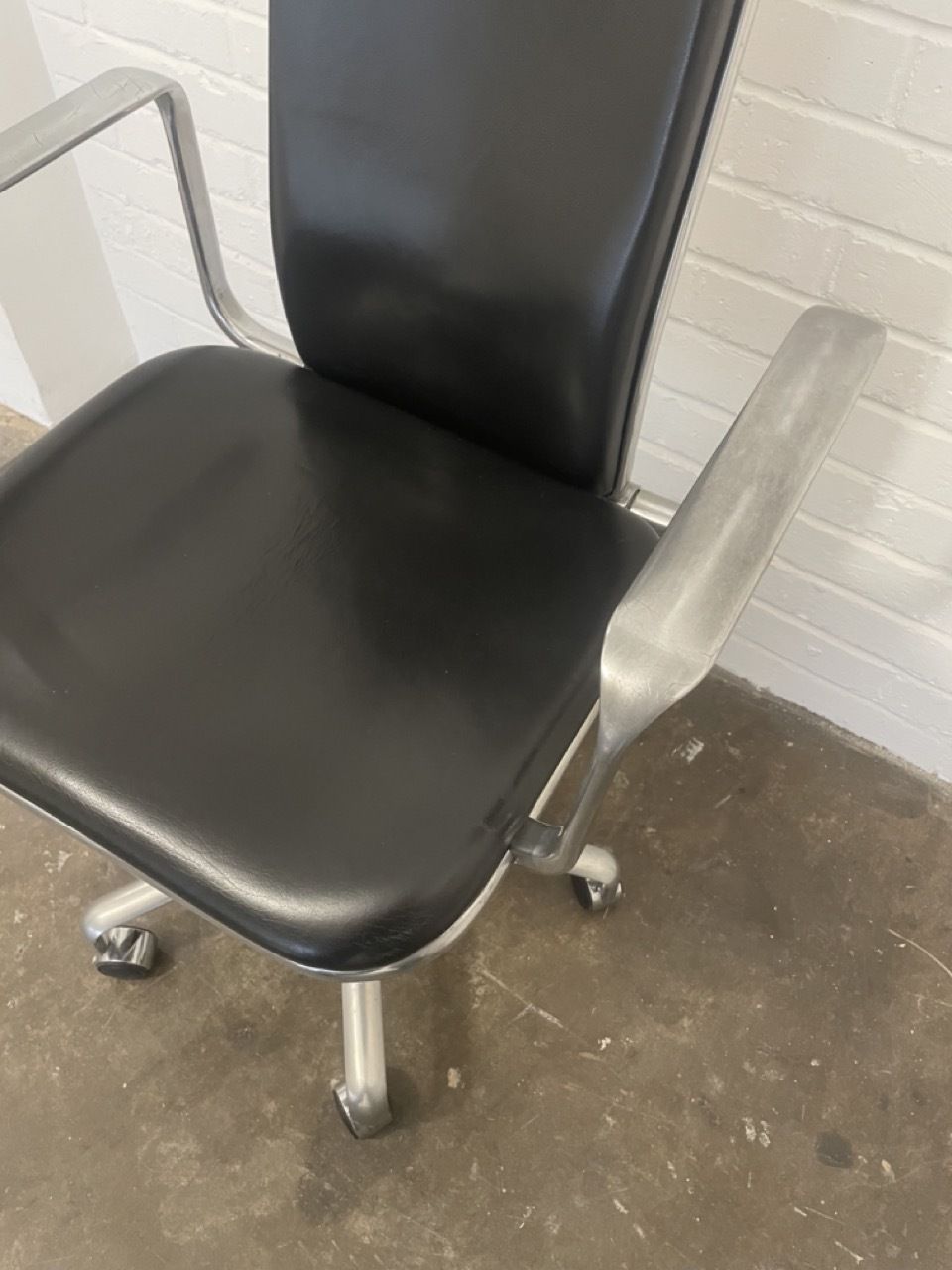 photo for sale Vintage Hille Fred Scott Supporto Task Chair. High Back With Arms In Polished Aluminium With Black Leatheri Seat Pads