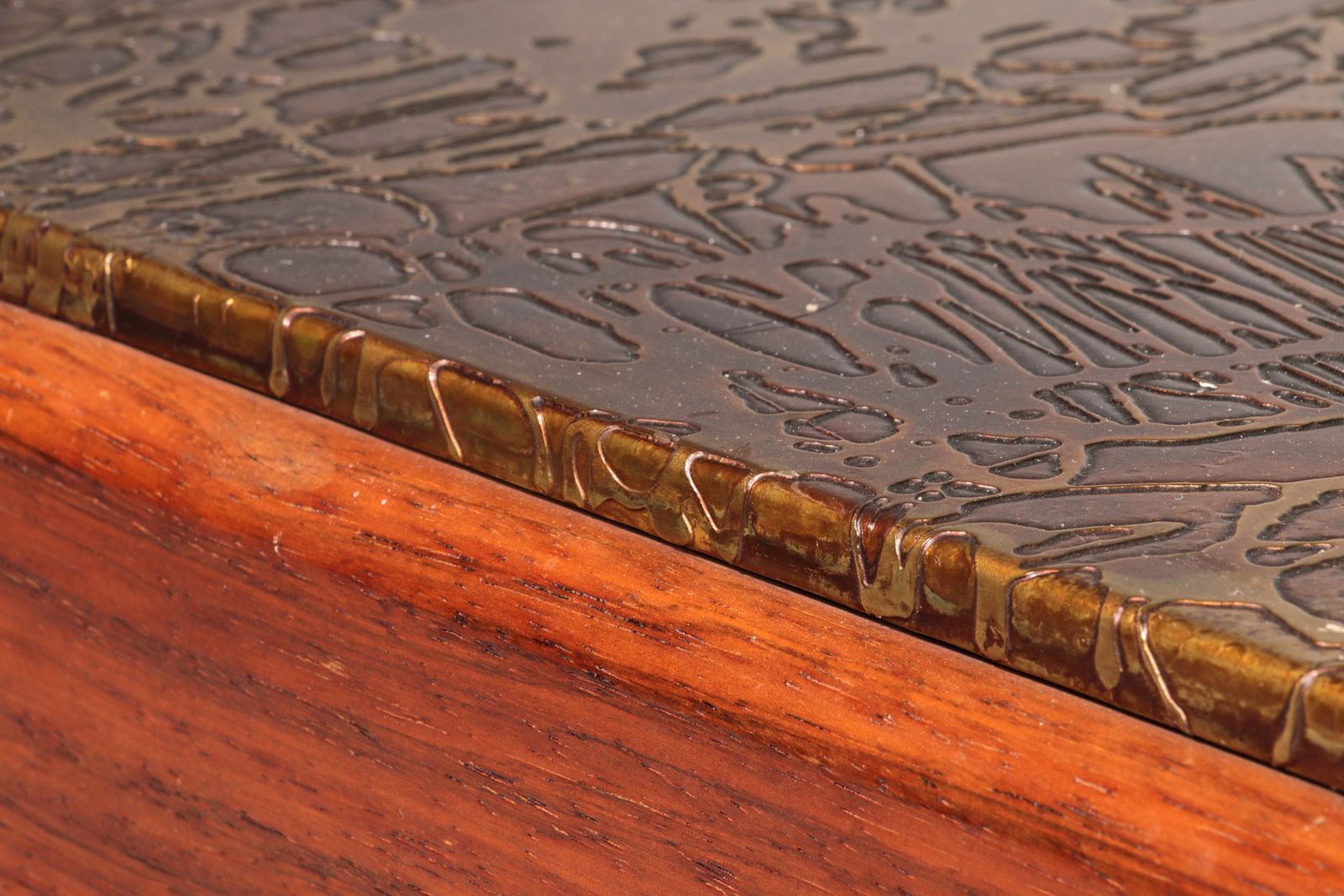 photo furniture Brutalist Coffee Table With Copper Top And Wooden Base