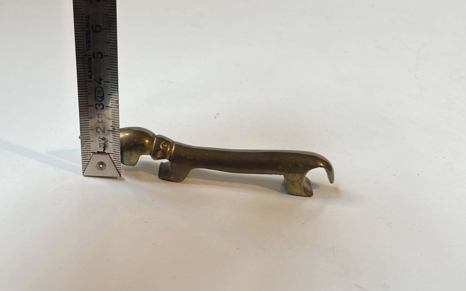"Noodle" Dachshund Brass Dog Bottle Opener By Bosse Vienna Austria, 1950s photo vintage