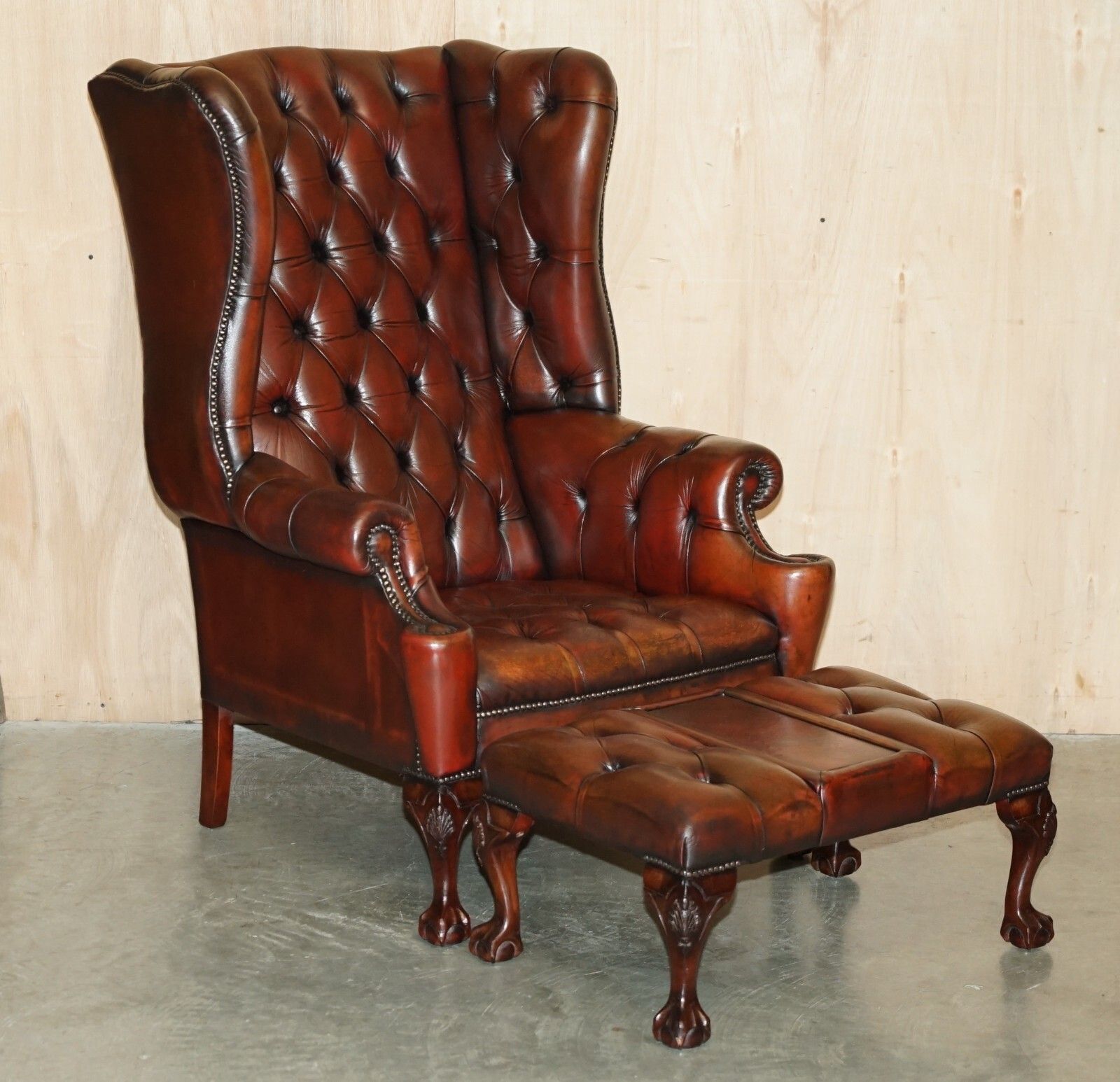 Pair Of Fully Restored Chesterfield Claw & Ball Feet Wingback Armchairs & Stools photo for sale