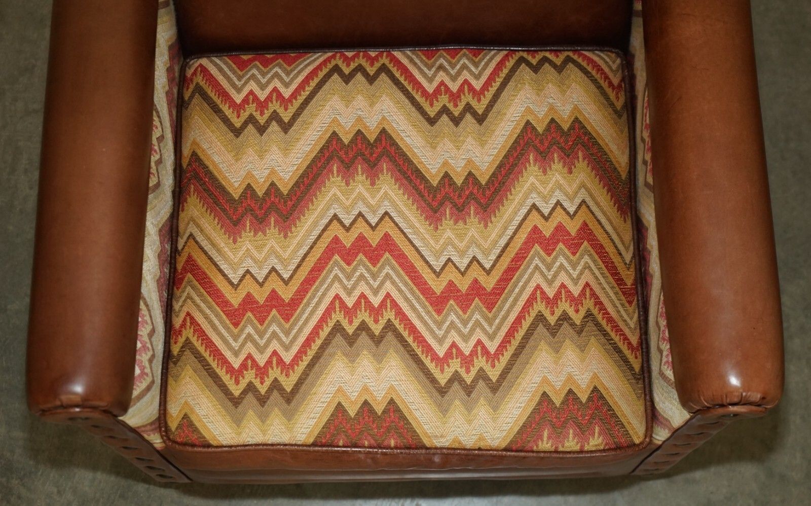 Pair Of Andrew Martin Marlborough Brown Leather Reversible Kilim Armchairs photo 2500.0