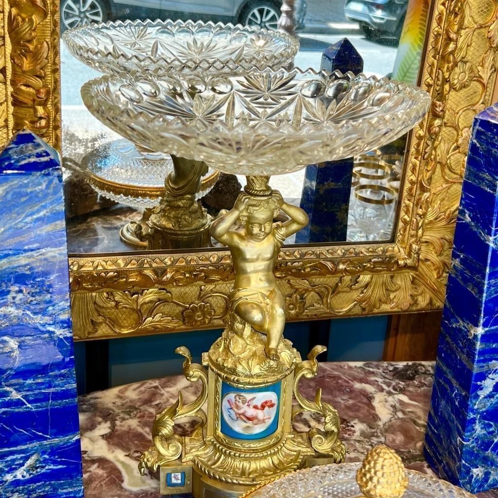 photo furniture 19th Century Cut Crystal Bowl On A Gilt Bronze Pedestal With Putti Motifs