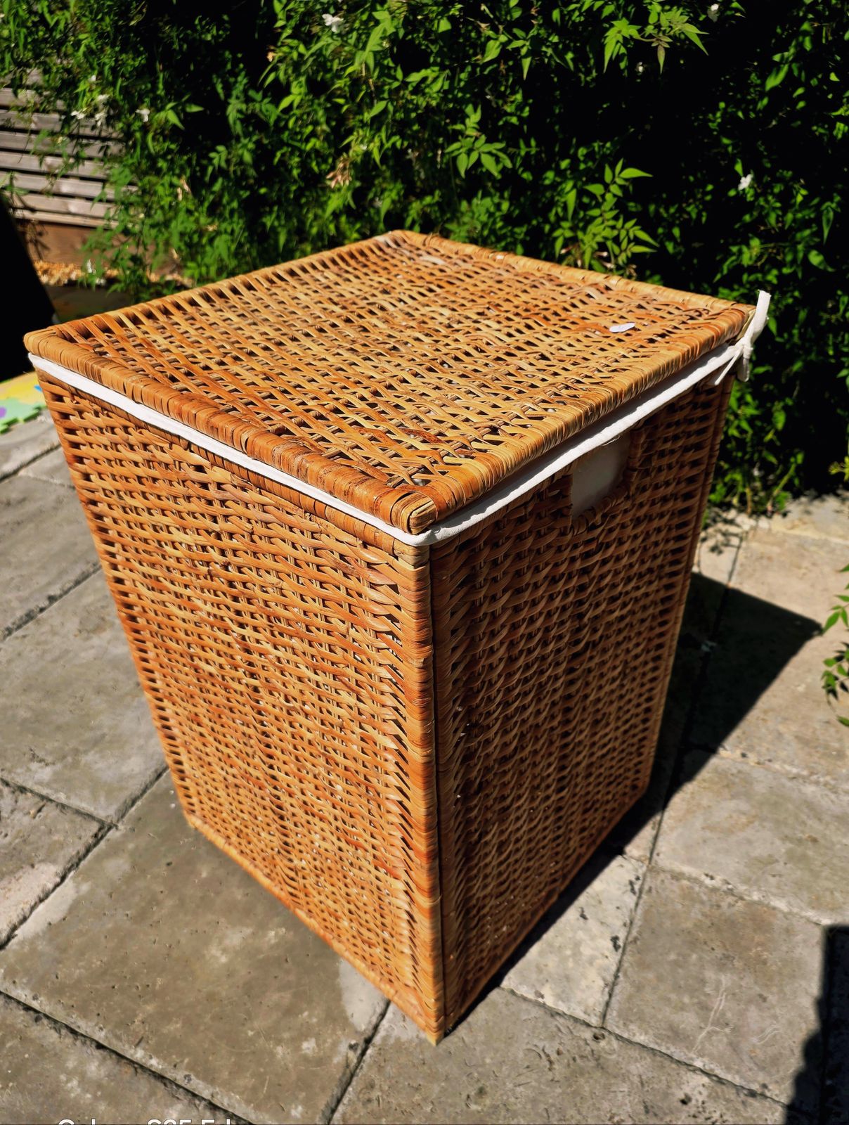 Tall Wicker Laundry Basket With Cream Linen Interior photo vintage