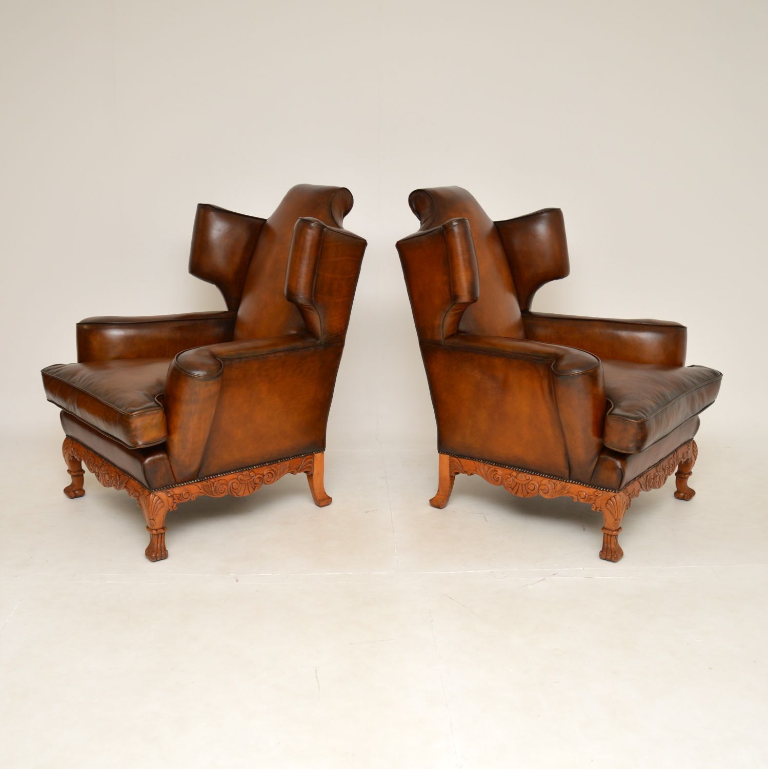 Pair Of Antique Leather Wing Back Armchairs photo furniture