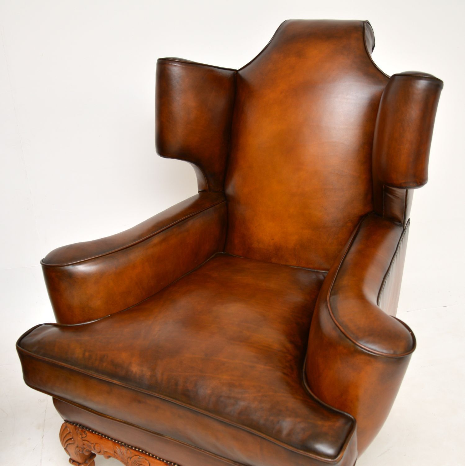 Pair Of Antique Leather Wing Back Armchairs photo 4550.0