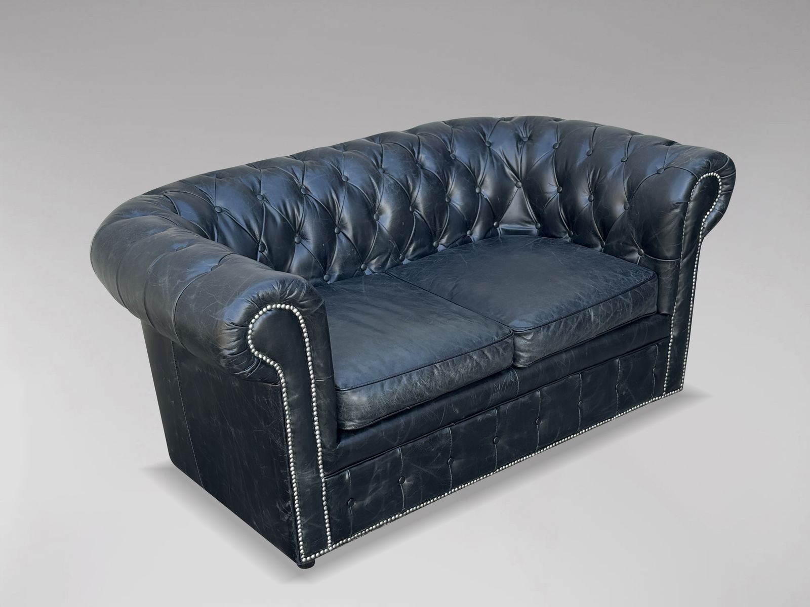Two Seater Black Leather Chesterfield Sofa photo vintage