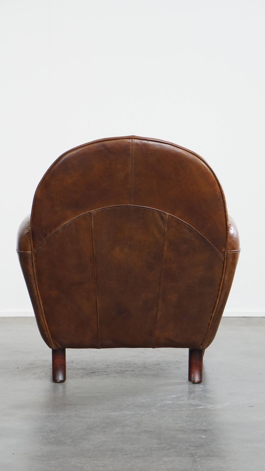 Characterful And Timeless Cowhide Design Armchair With Beautiful Round Shapes And Decorative Nails photo Furniture