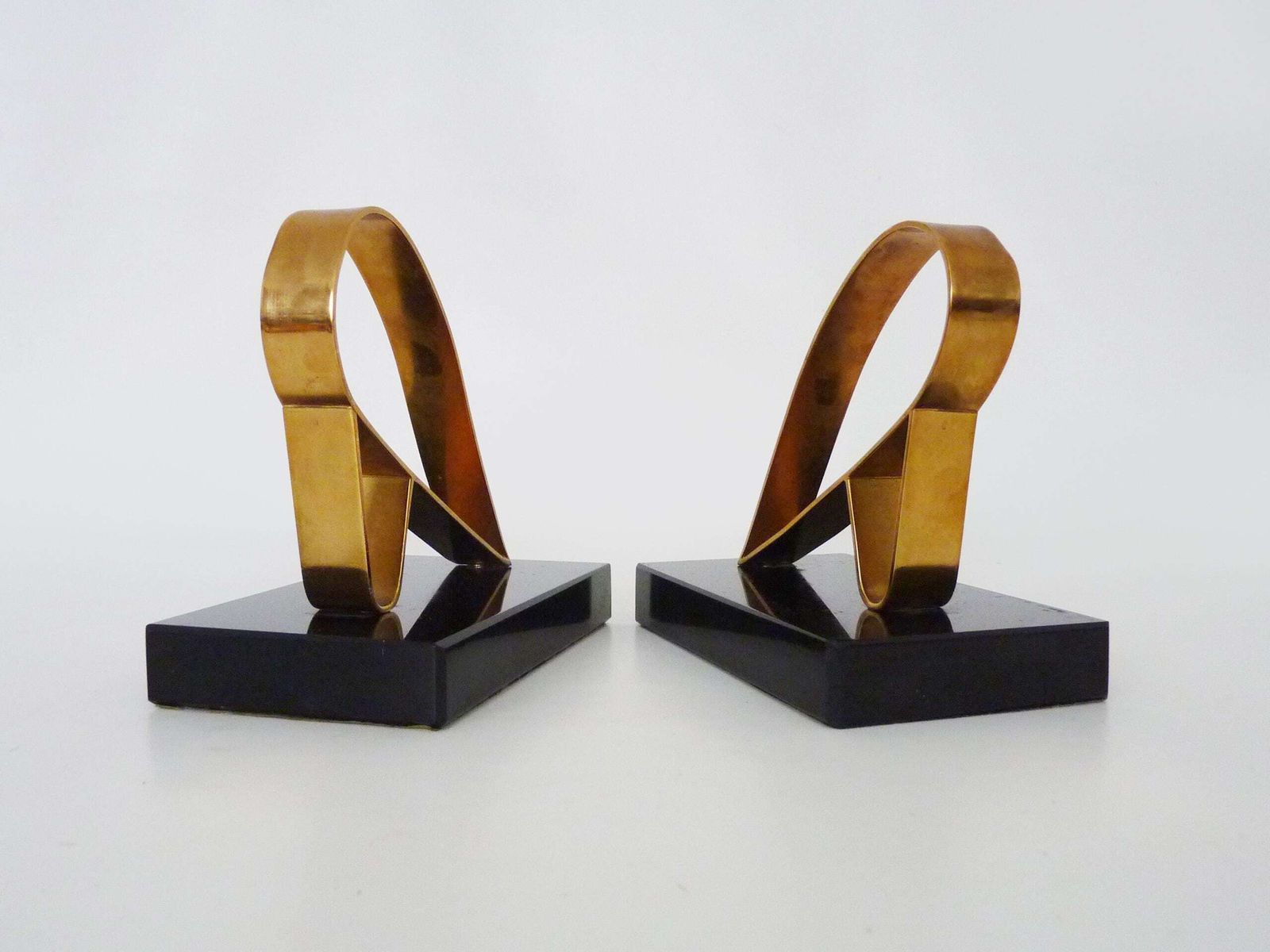 Pair Of Modernist Art Deco Gold Starry Bookends On A Black Marble Base. photo buy