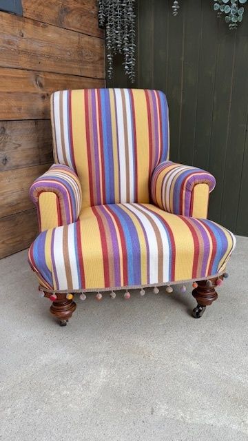 Traditionally Upholstered Country House Lounge Armchair With Brass Castors