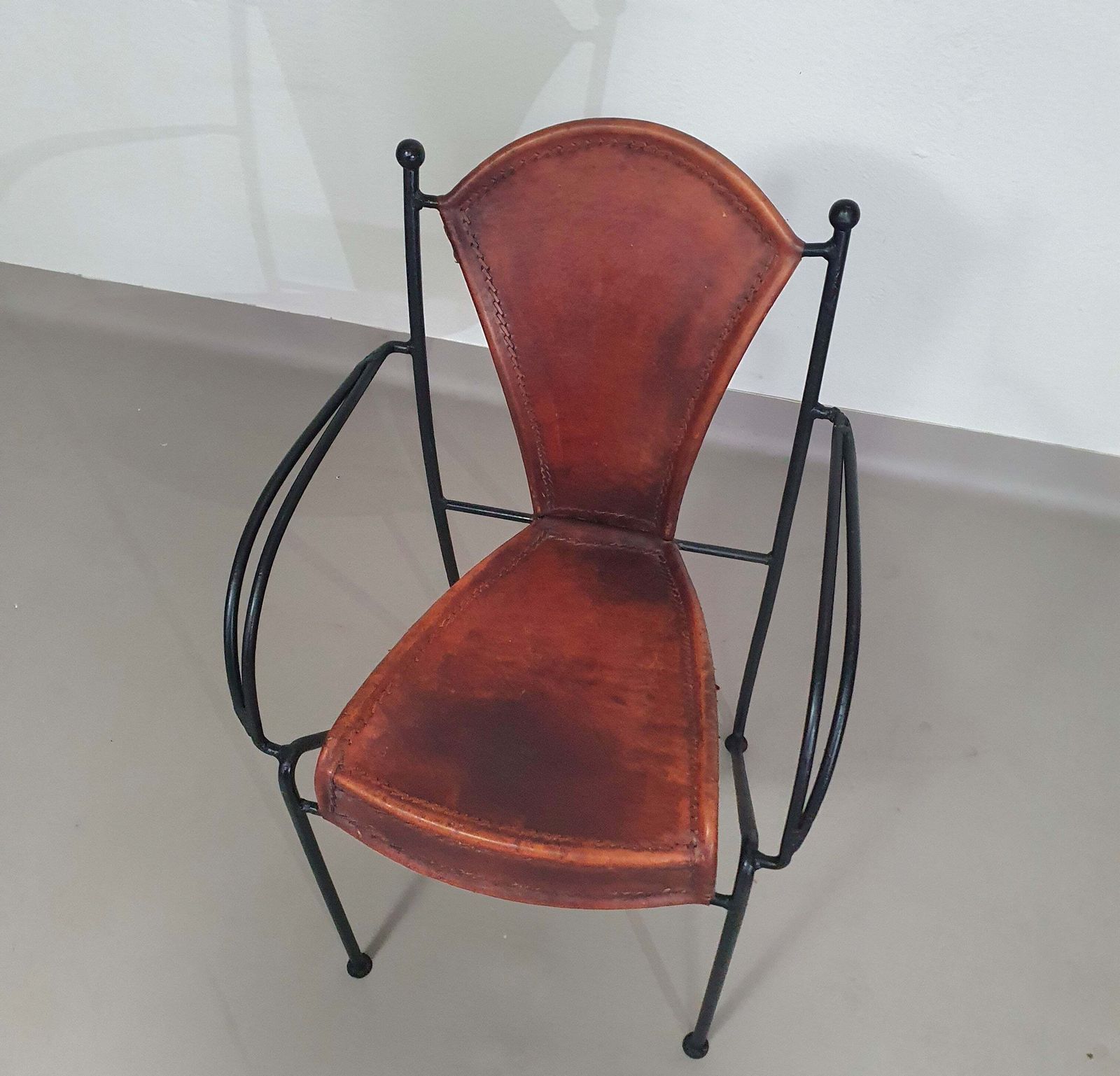 24 Chairs In Leather And Solid Wrought Iron photo furniture