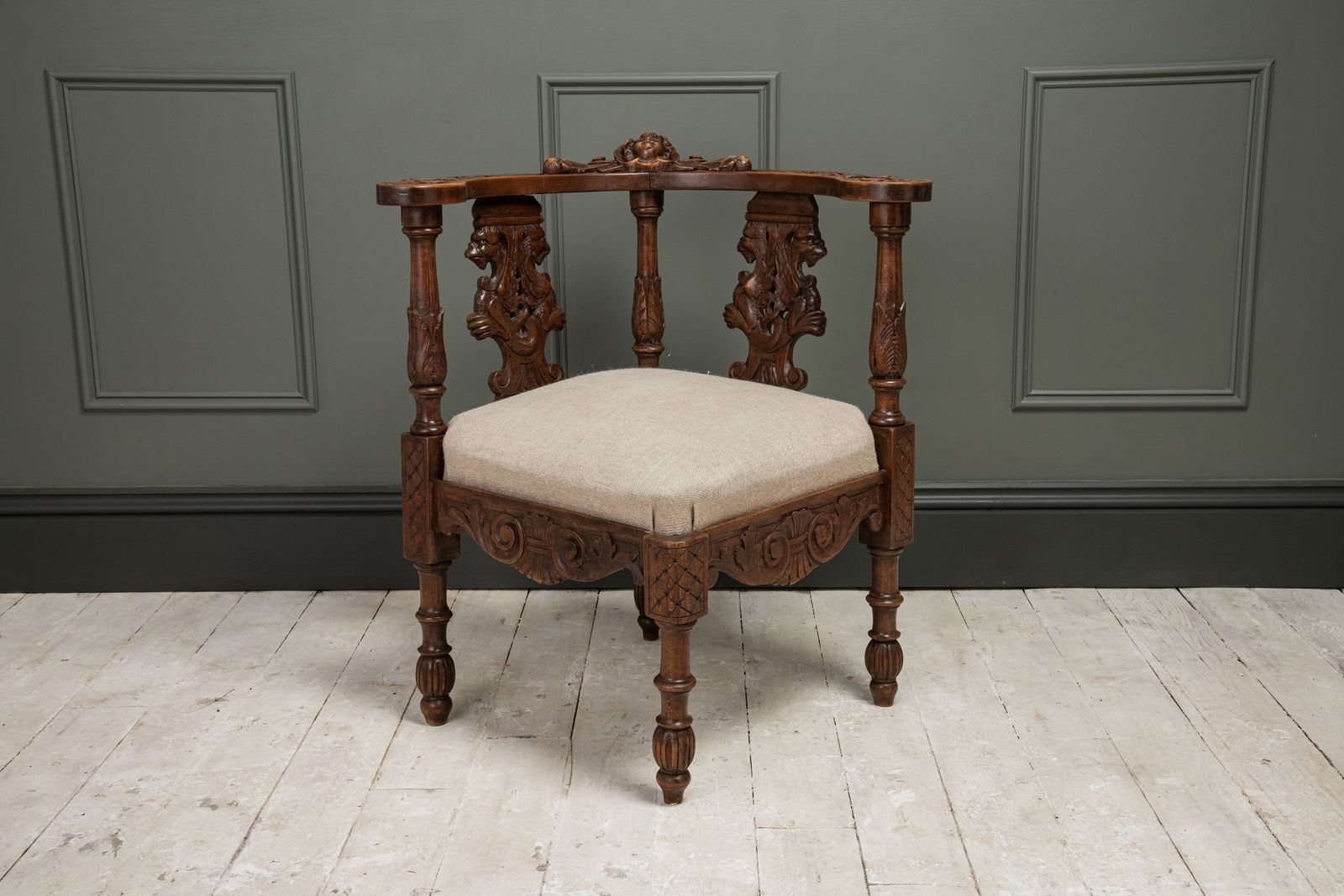 A Carved Italian Walnut Figural Corner Chair, C.1860